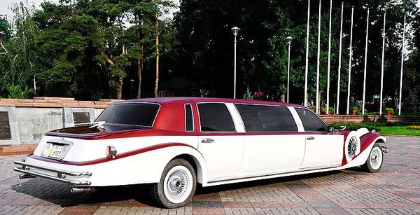 Лимузин ретро Excalibur бело-бордовый на свадьбу