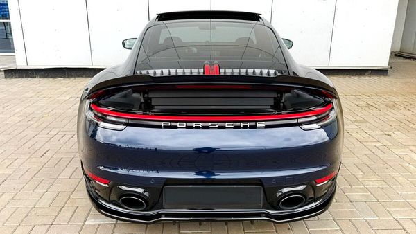 Прокат Porsche 911 Carrera S темно синій без водія на фото зйомки