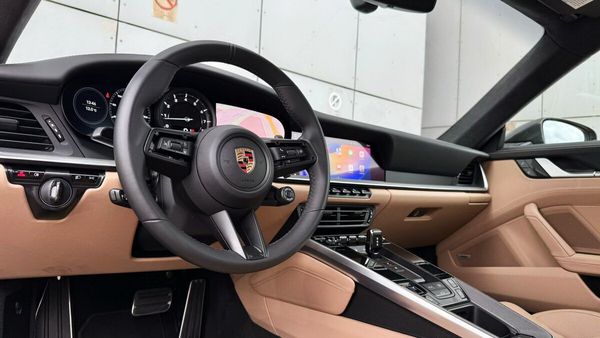 Прокат Porsche 911 Carrera S темно синій без водія на фото зйомки